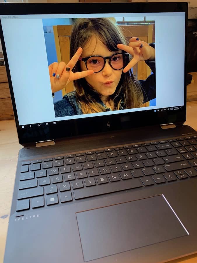 photo of computer with my daughter