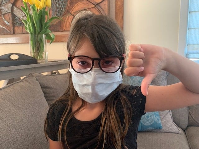 my daughter with glasses and mask